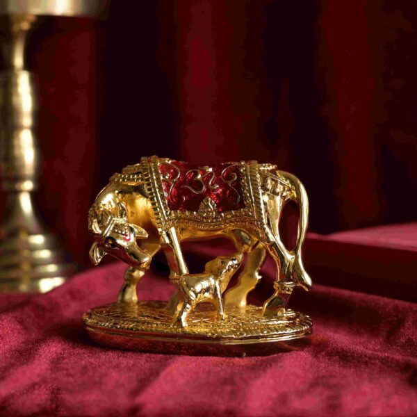 Cow calf with gold platted Meena work